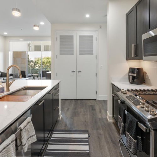a kitchen with a marble counter top